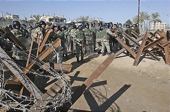 Egyptian security seals the border wall in Rafah on Feb. 3, 2008, with metal spikes. (AP Photo / Adel Hana)
